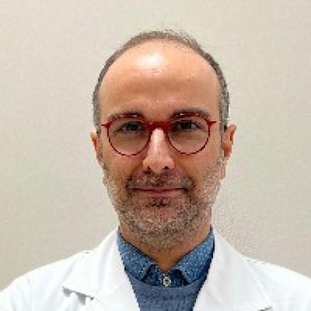 Dr. Carlos Martínez Rico